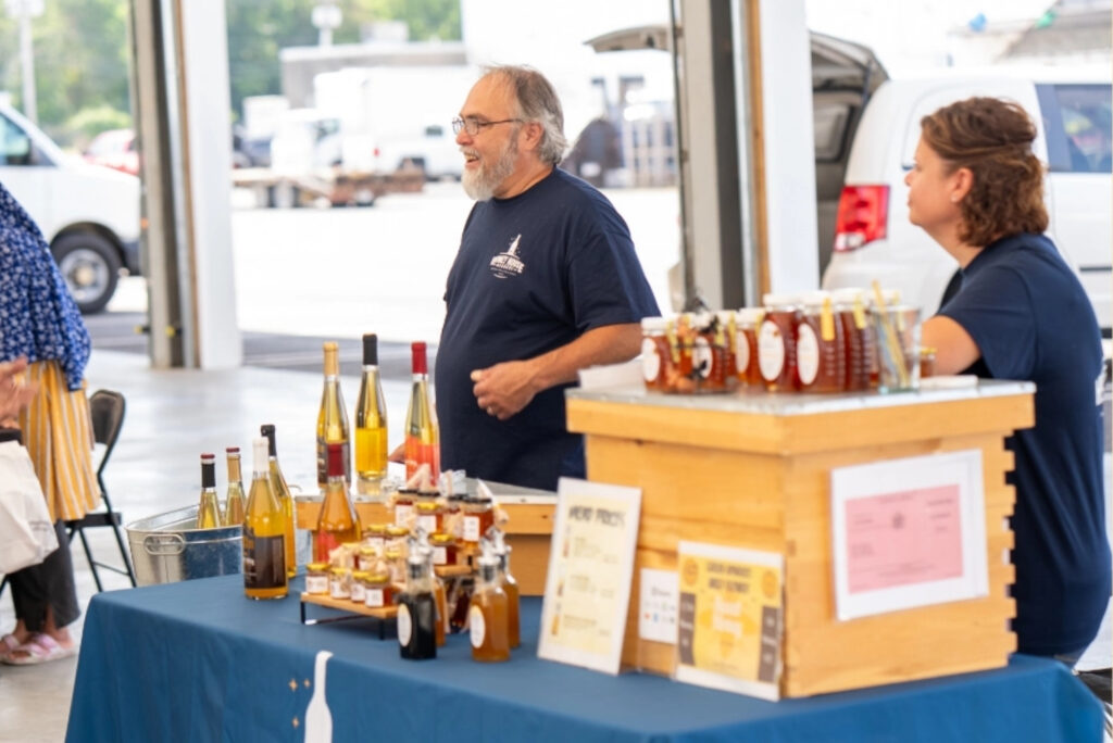 Honey House Meadery, vendor at the Saturday Farmers Market in Menands, is set up in the Menands Market Pavilion